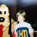 My brother, Steve, and me meeting Pluto at Disney World